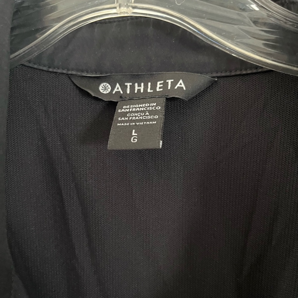 ATHLETA TOPSPIN DRESS BLACK SHORT SLEEVE ZIP
FRONT CINCH 
Size L - Picture 2 of 3